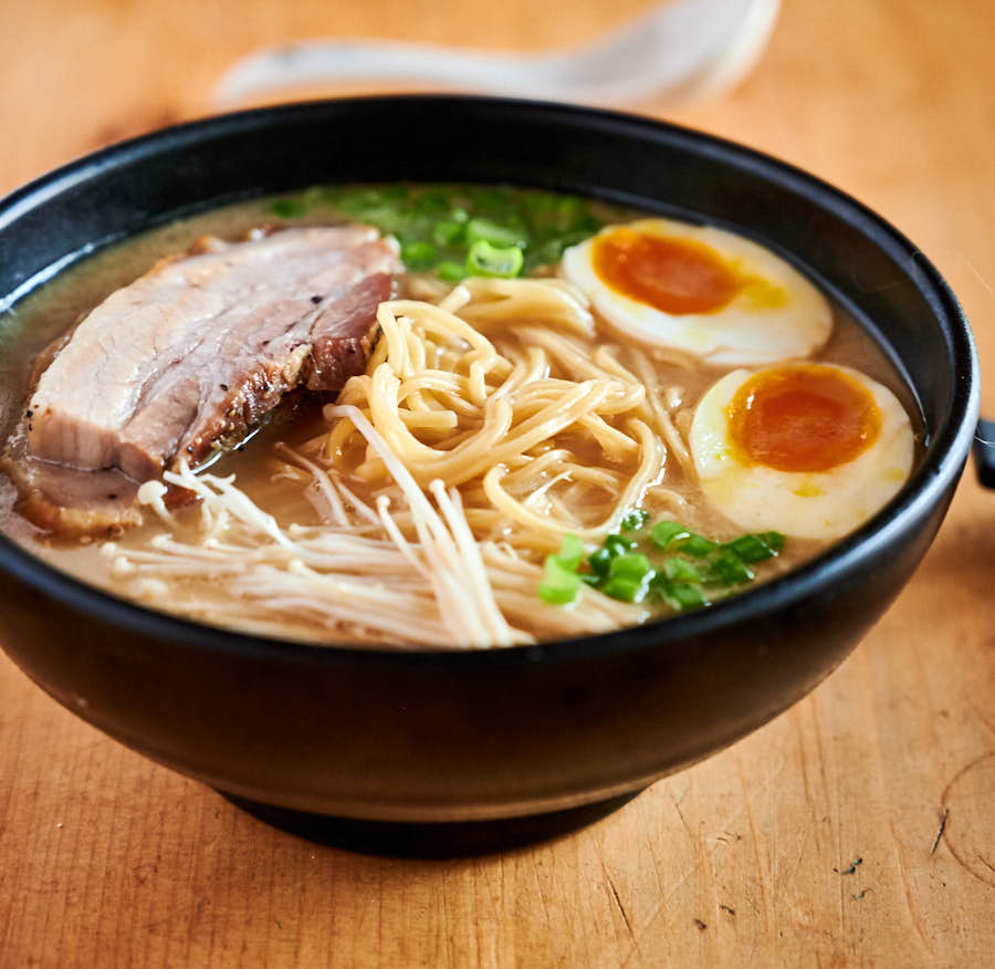 Bowl of ramen with noodles, broth, and toppings